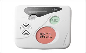 「緊急」「相談」「取消」と書かれた大きく色分けされたボタンが配置された四角い機械の写真